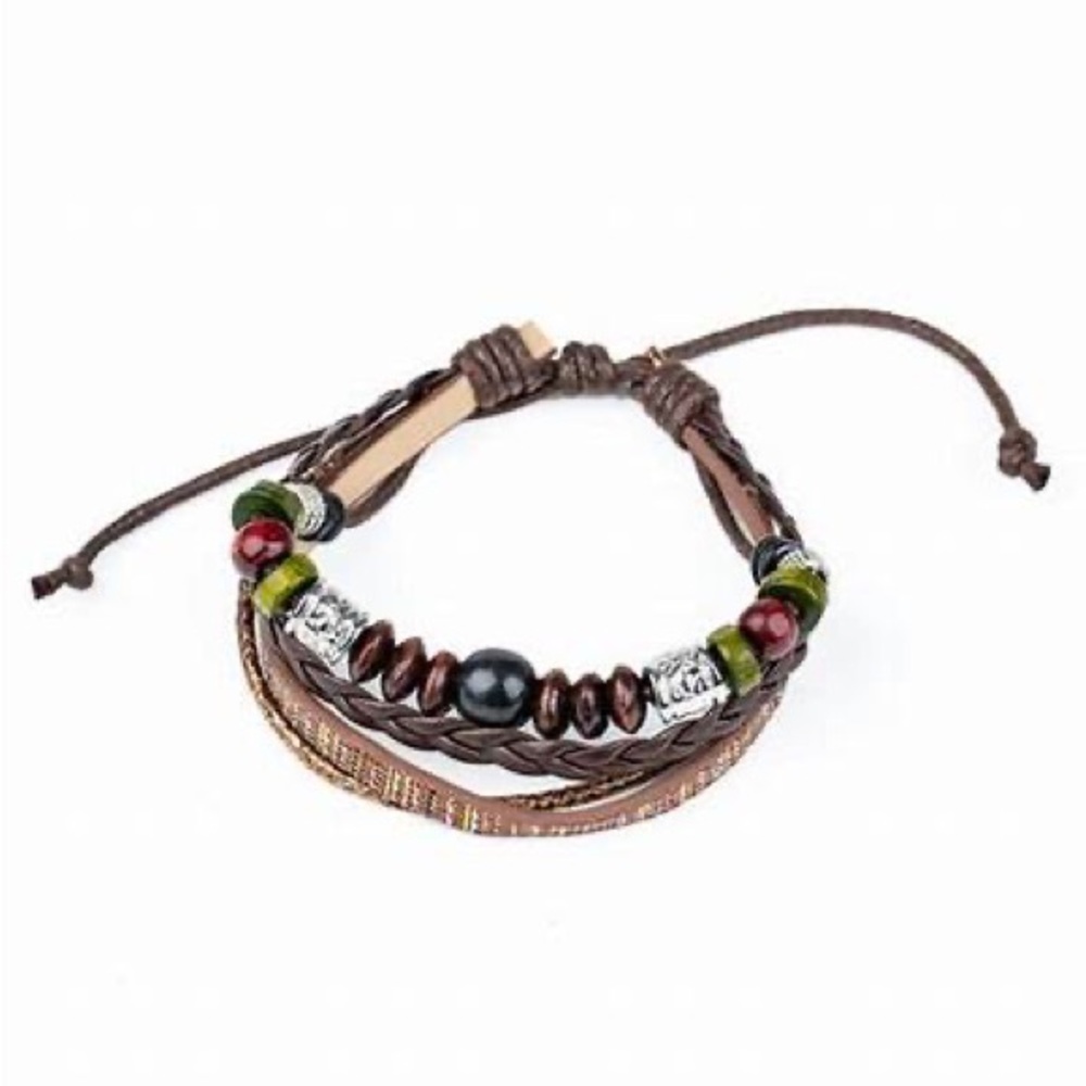 Multi colorfully threaded adjustable sliding knot bracelet.